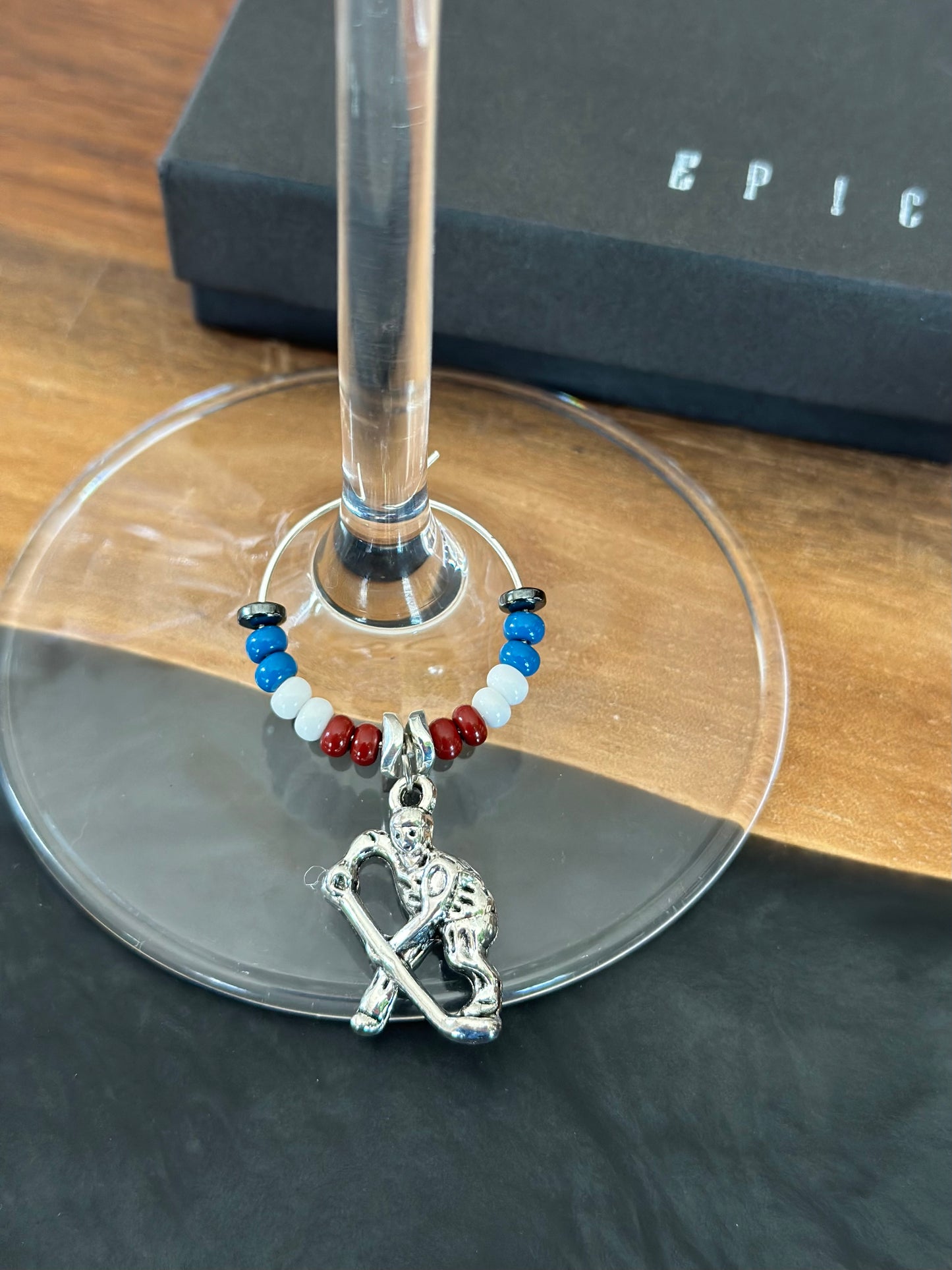 Hockey player wine charm