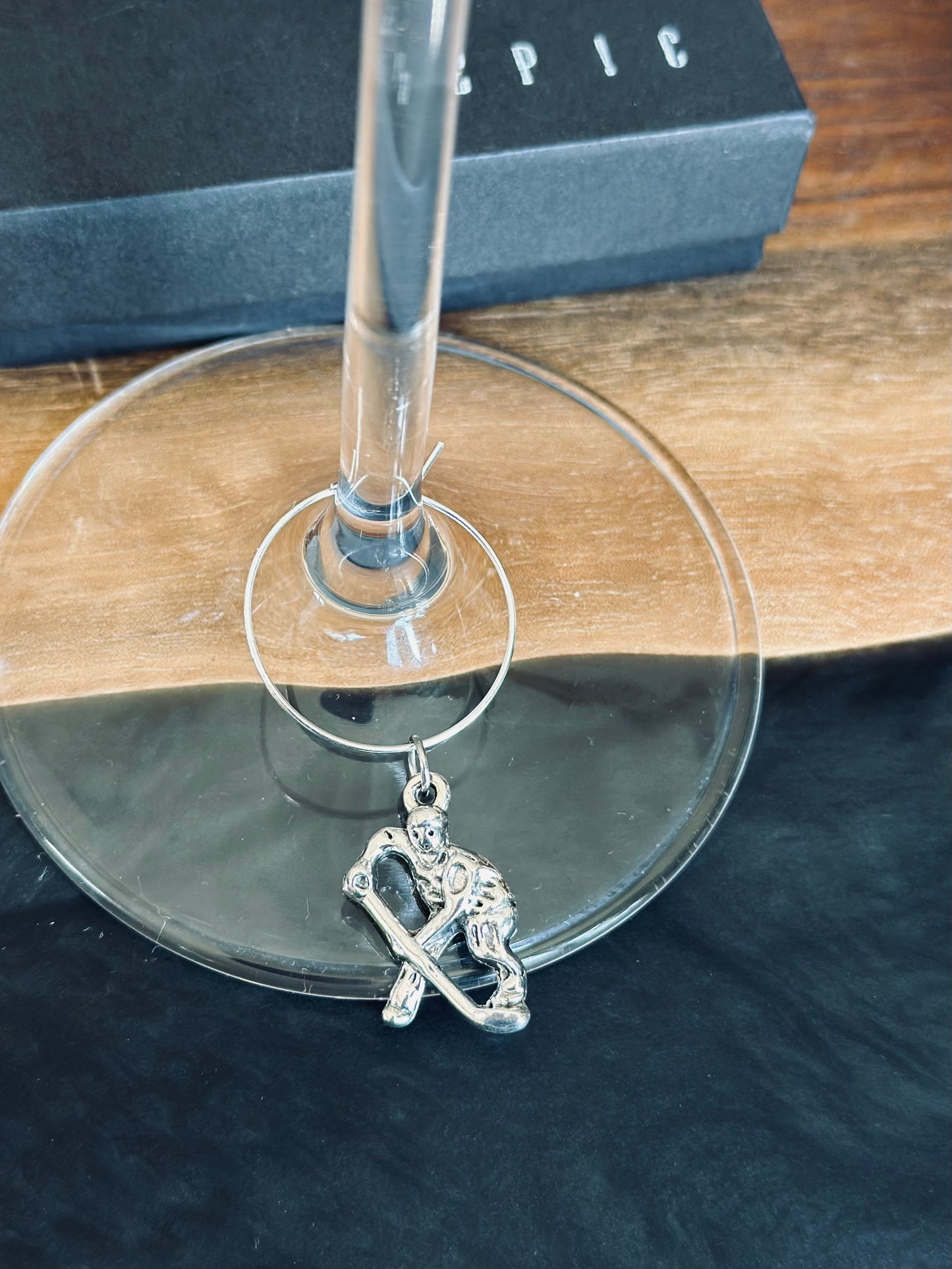 Hockey player wine charm