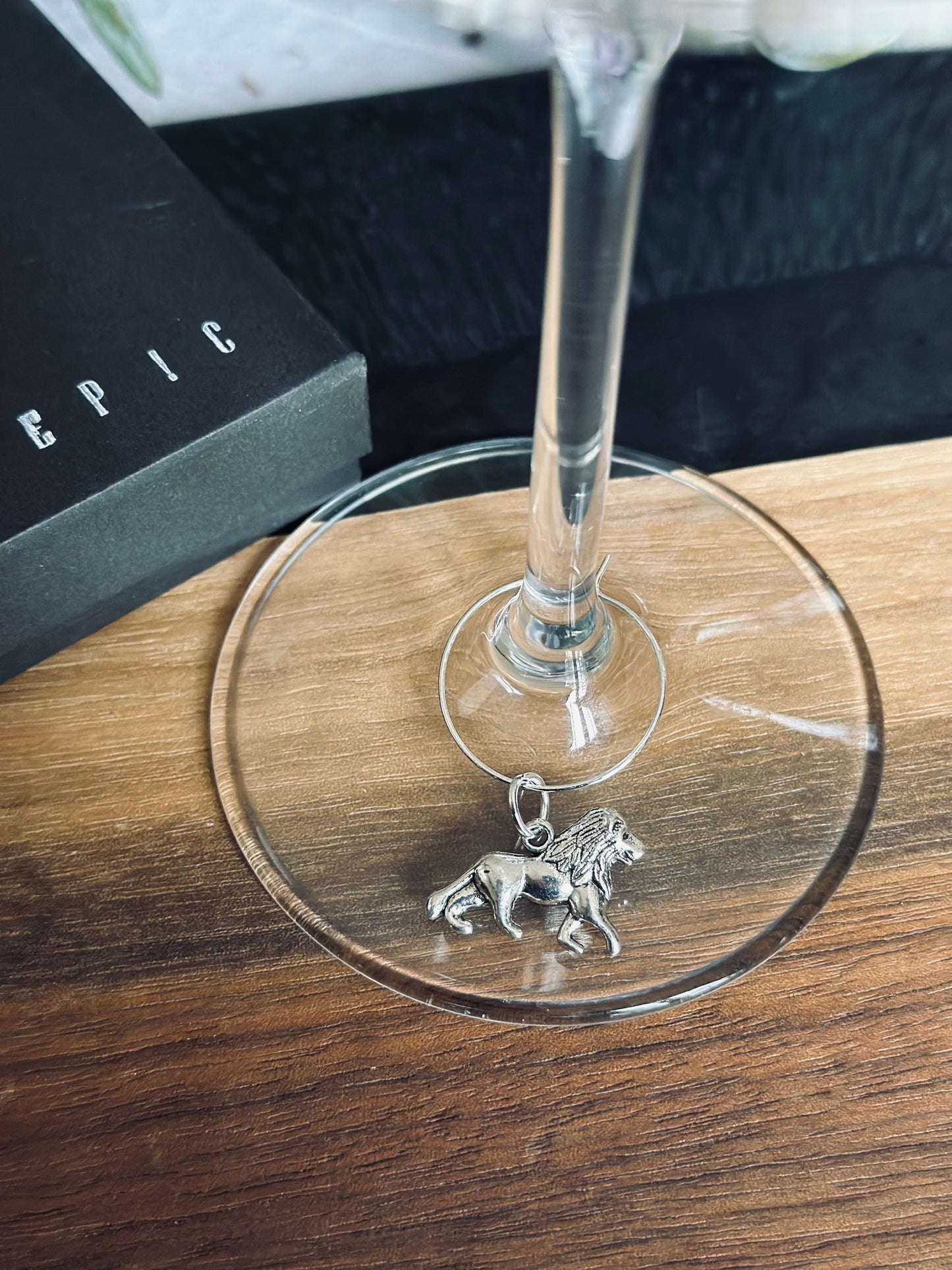 Lion wine charm