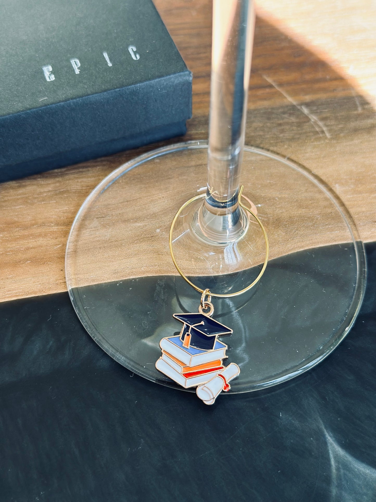 Graduation cap and books wine charm