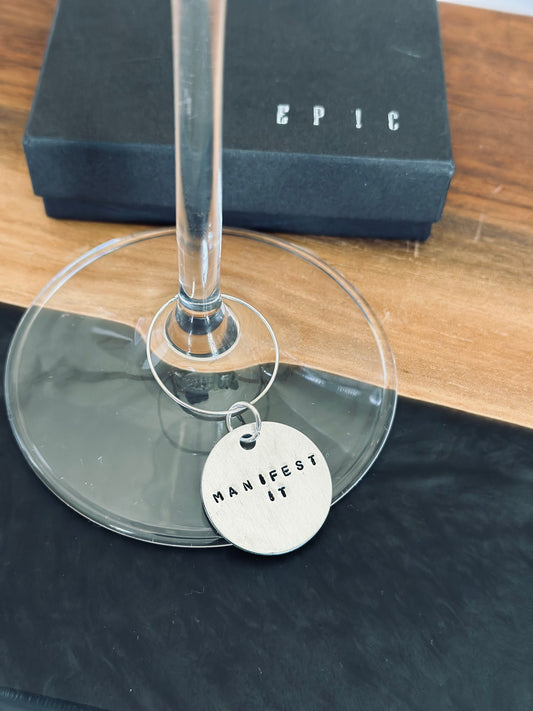 MANIFEST IT wine charm hand stamped