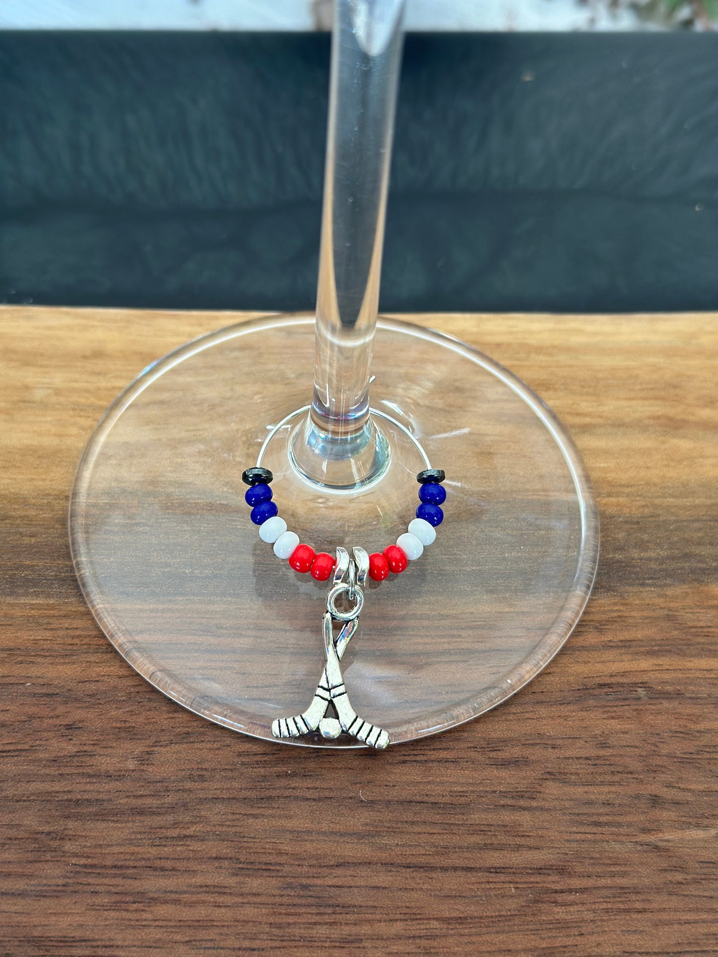 Hockey sticks wine charm